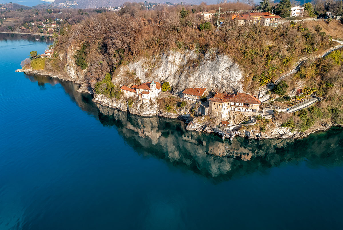 Aerial view of Santa Caterina del Sasso hermitage on Lake Maggiore