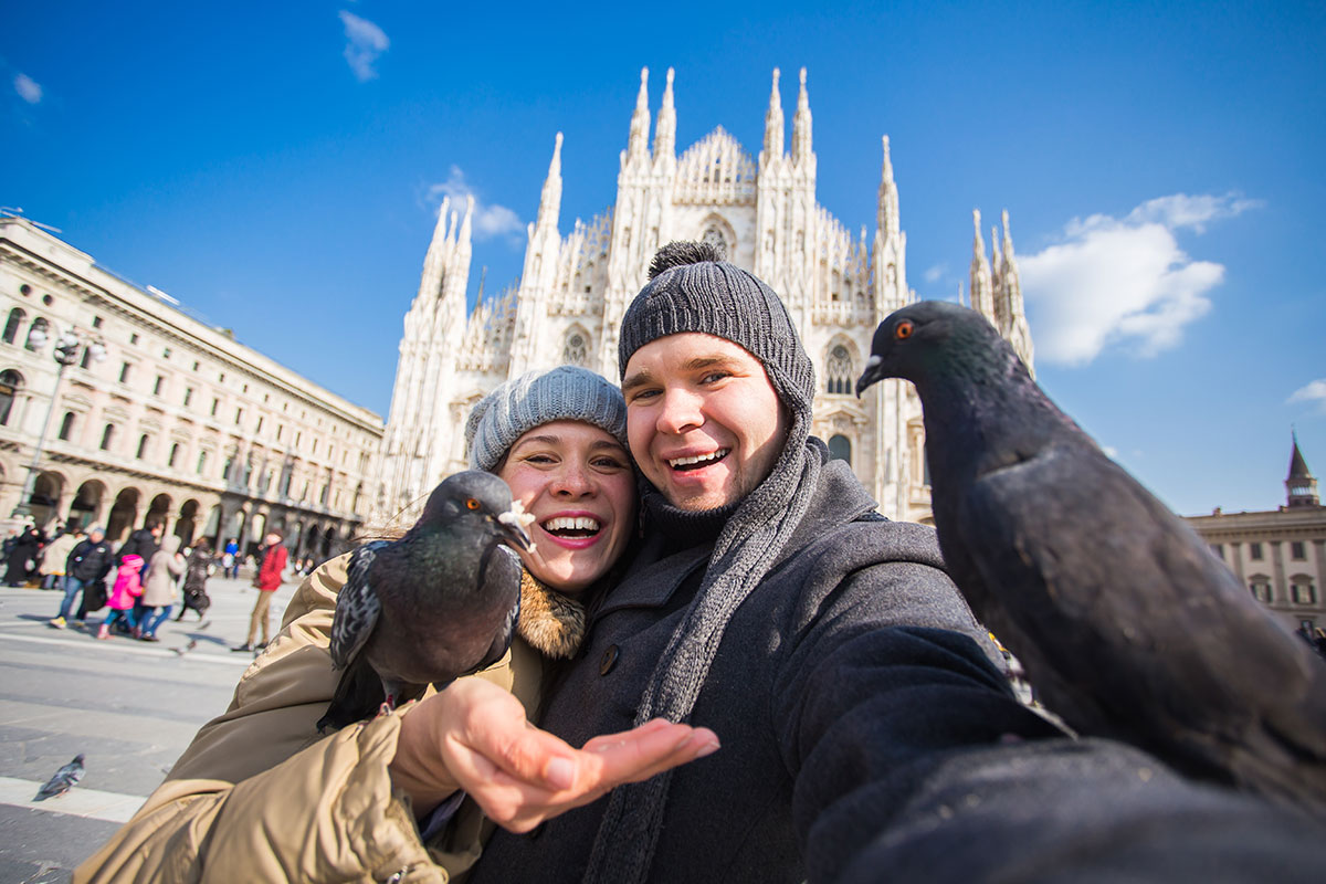 A Milanese couple dressed ready for winter 