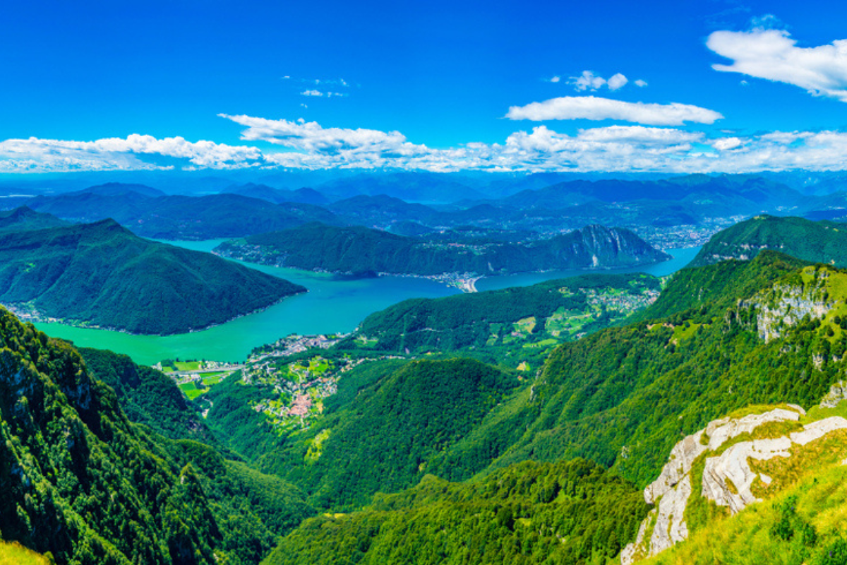 Aerial view of Lugano lake from Monte Generoso, Switzerland on a sunny day