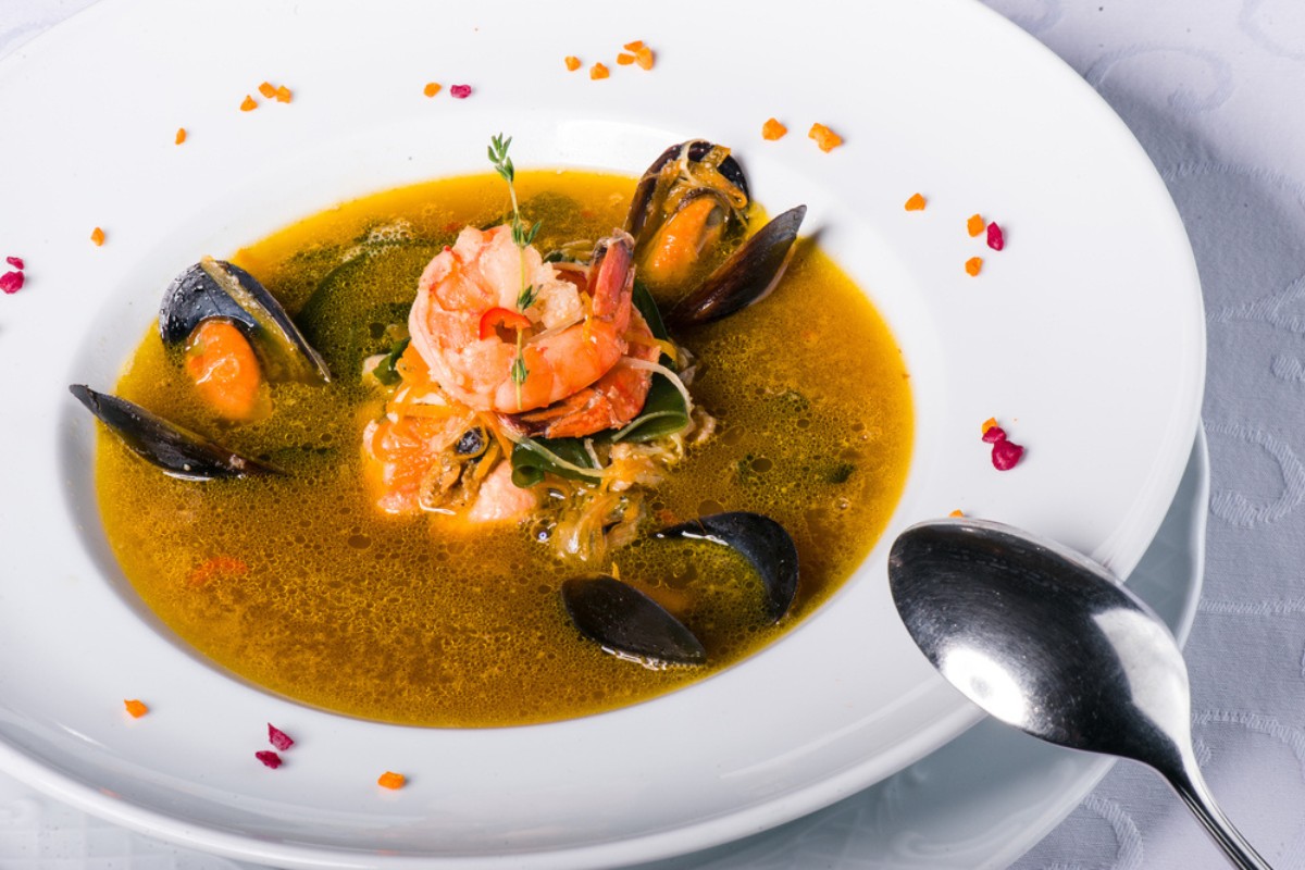 plate of Croatian fish stew, brudet, with mussels and prawns